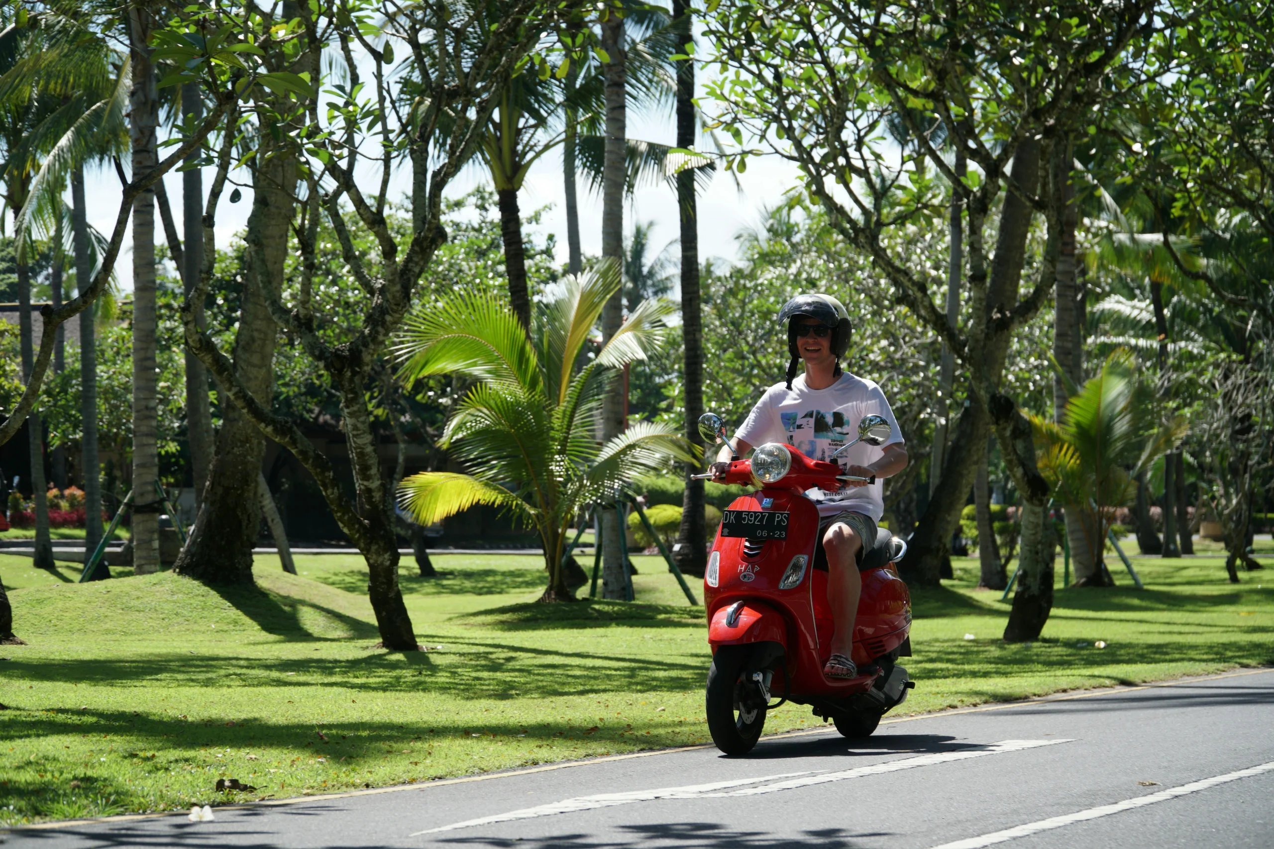 rent-a-scooter-bali-tourist-riding.webp