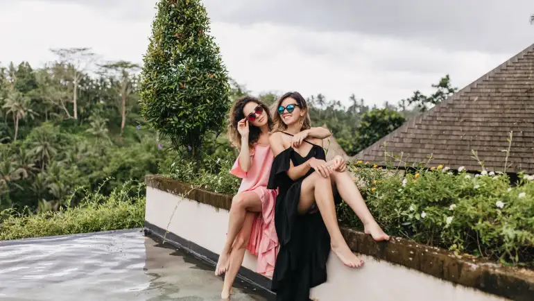 Bali vacation guide featuring a tropical beach and temple at sunset